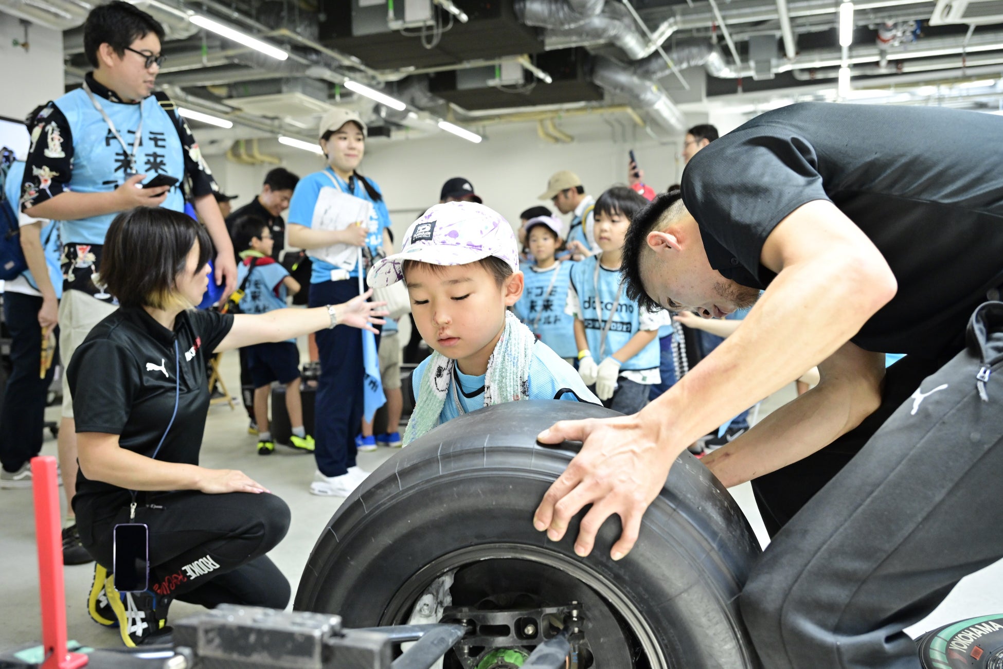 一流プレーヤーと共に、子どもたちが夢や将来を考えるきっかけをつくる「ドコモ未来フィールド」　第9弾は「ドコモ・チーム・ダンディライアン・レーシング」が“プロのフィールド”を子どもたちに披露